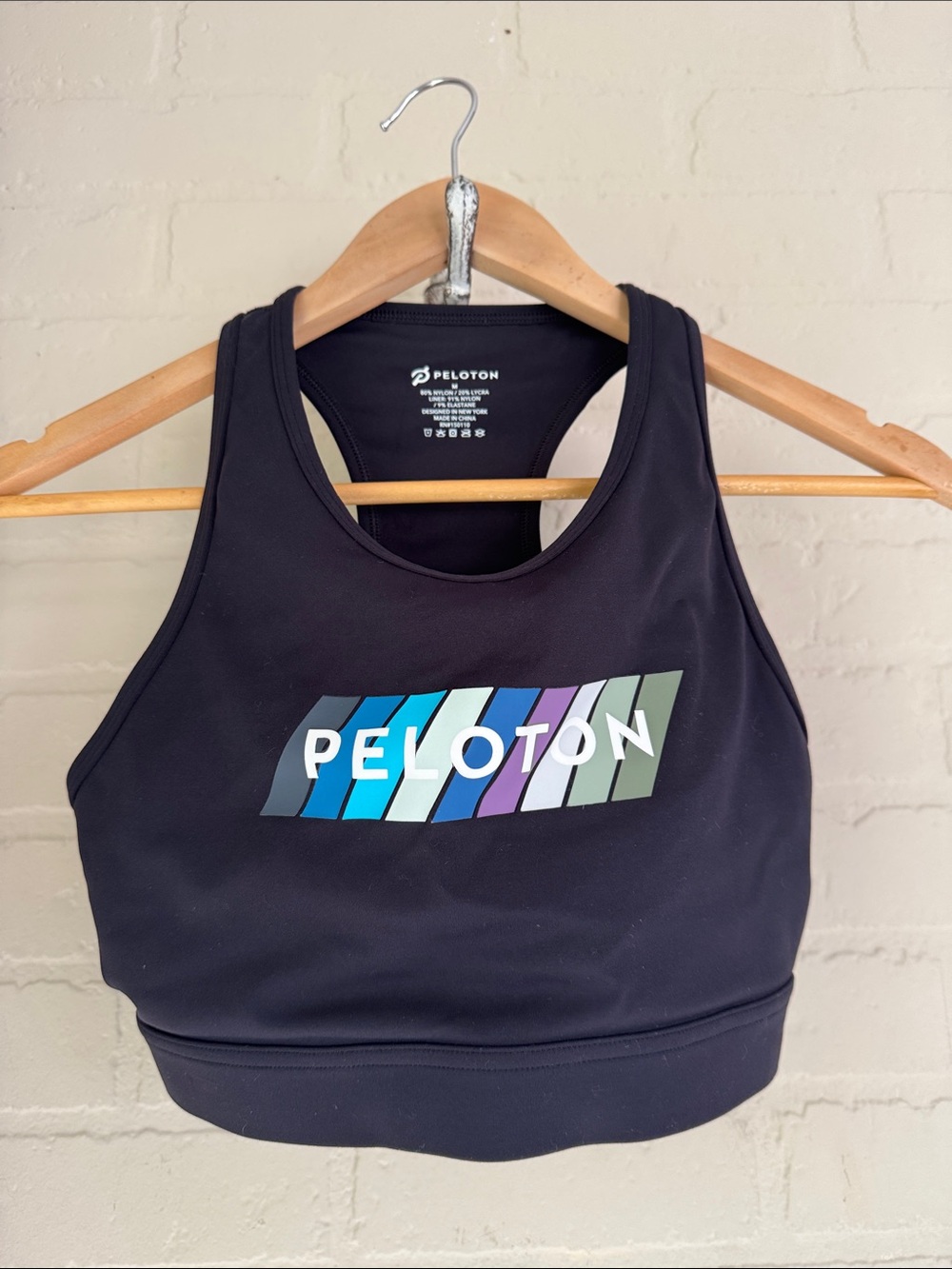Peloton Black Crop Sports Bra with Multicolor Stripe Logo medium